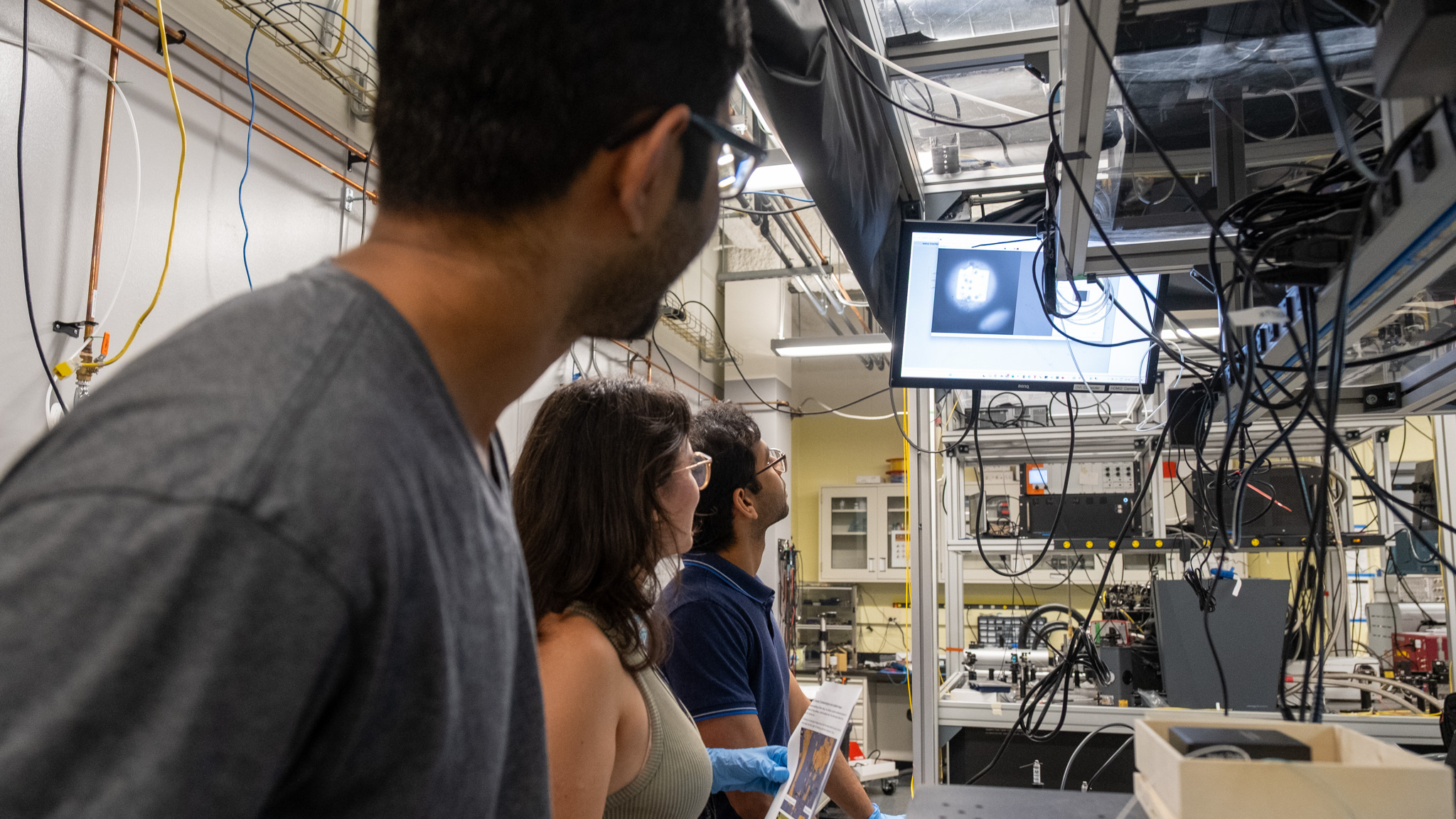 Researchers Tarun Patel, Catalina Morales Gutiérrez, Sayan Gangopadhyay (L-R) installing the QuanTour quantum dot
