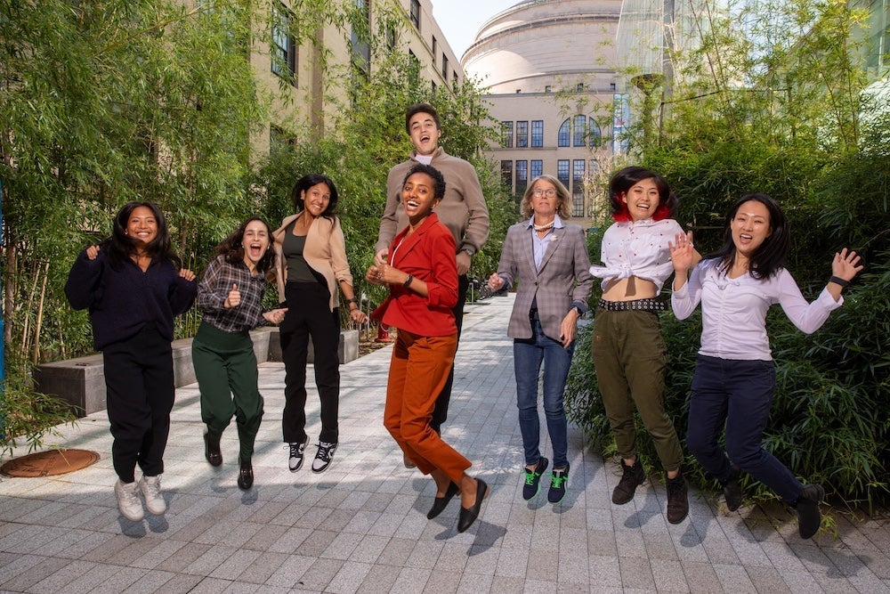 Group of people leaping in the air