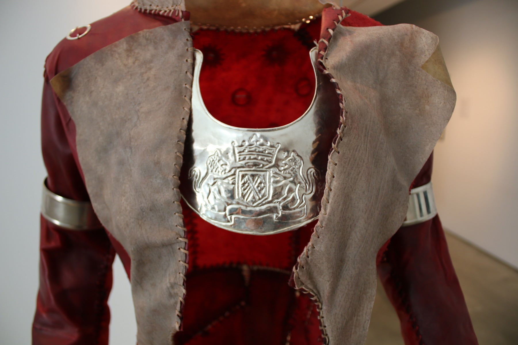 Close-up of The Redcoat showing rawhide and silver materials