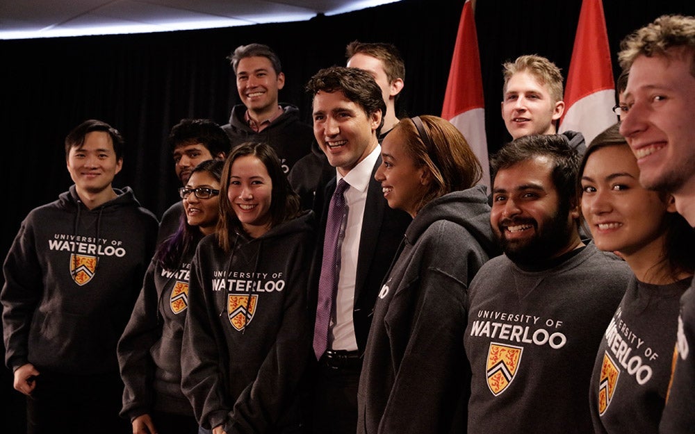 Justin Trudeau poses with a group of Waterloo students