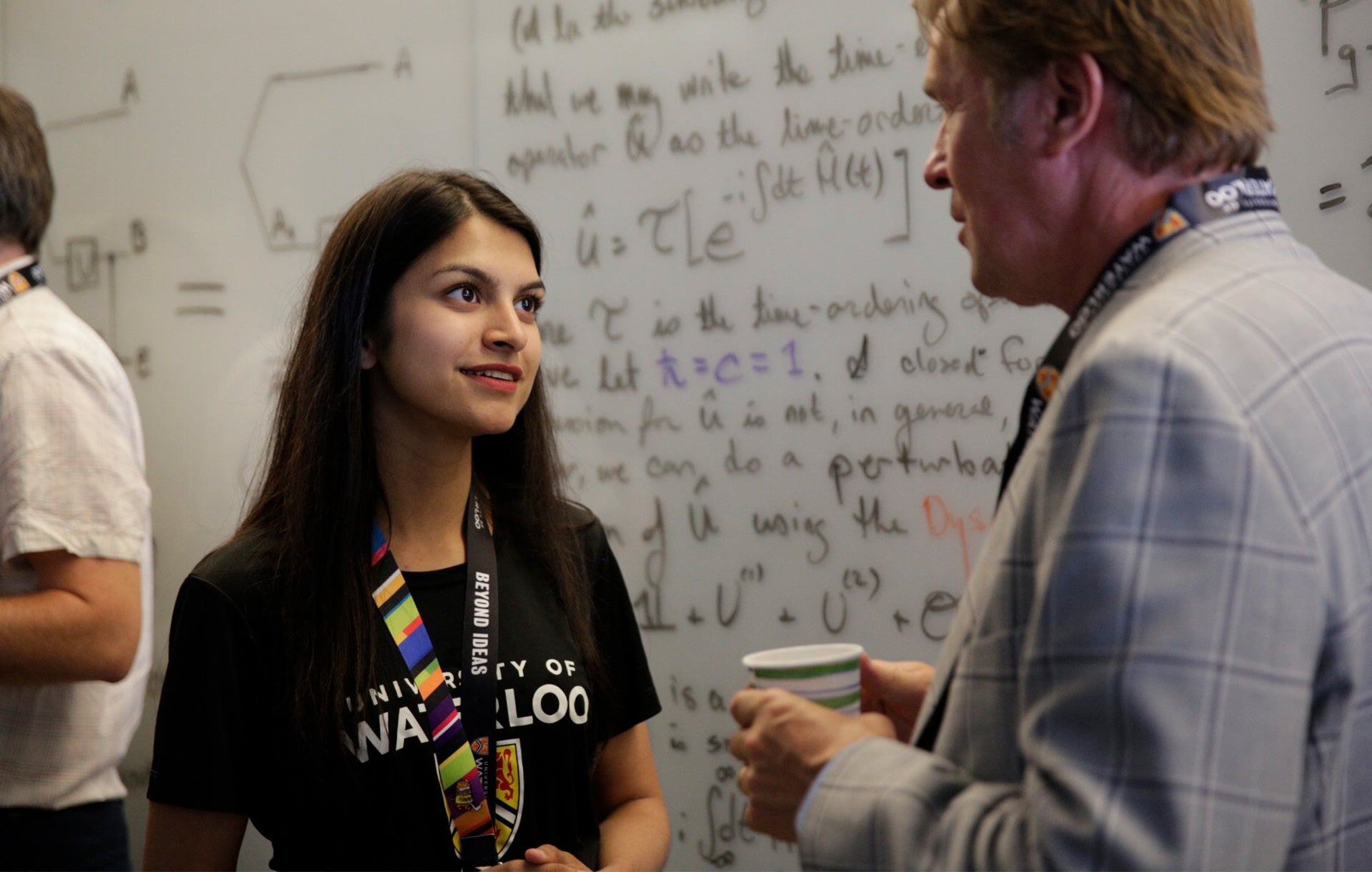 Volunteer speaking with guest