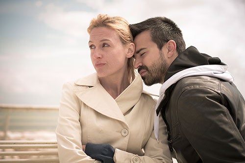 man and woman looking upset