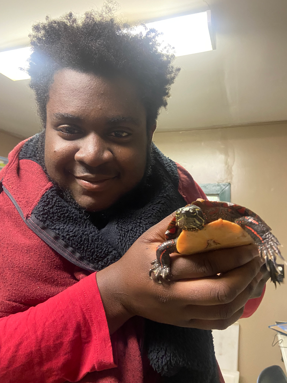 Dami holding a turtle. 