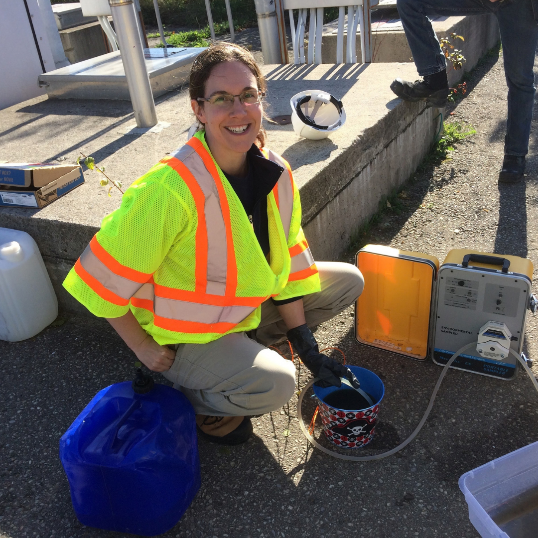 Dr. Laura Hug conducting field work.