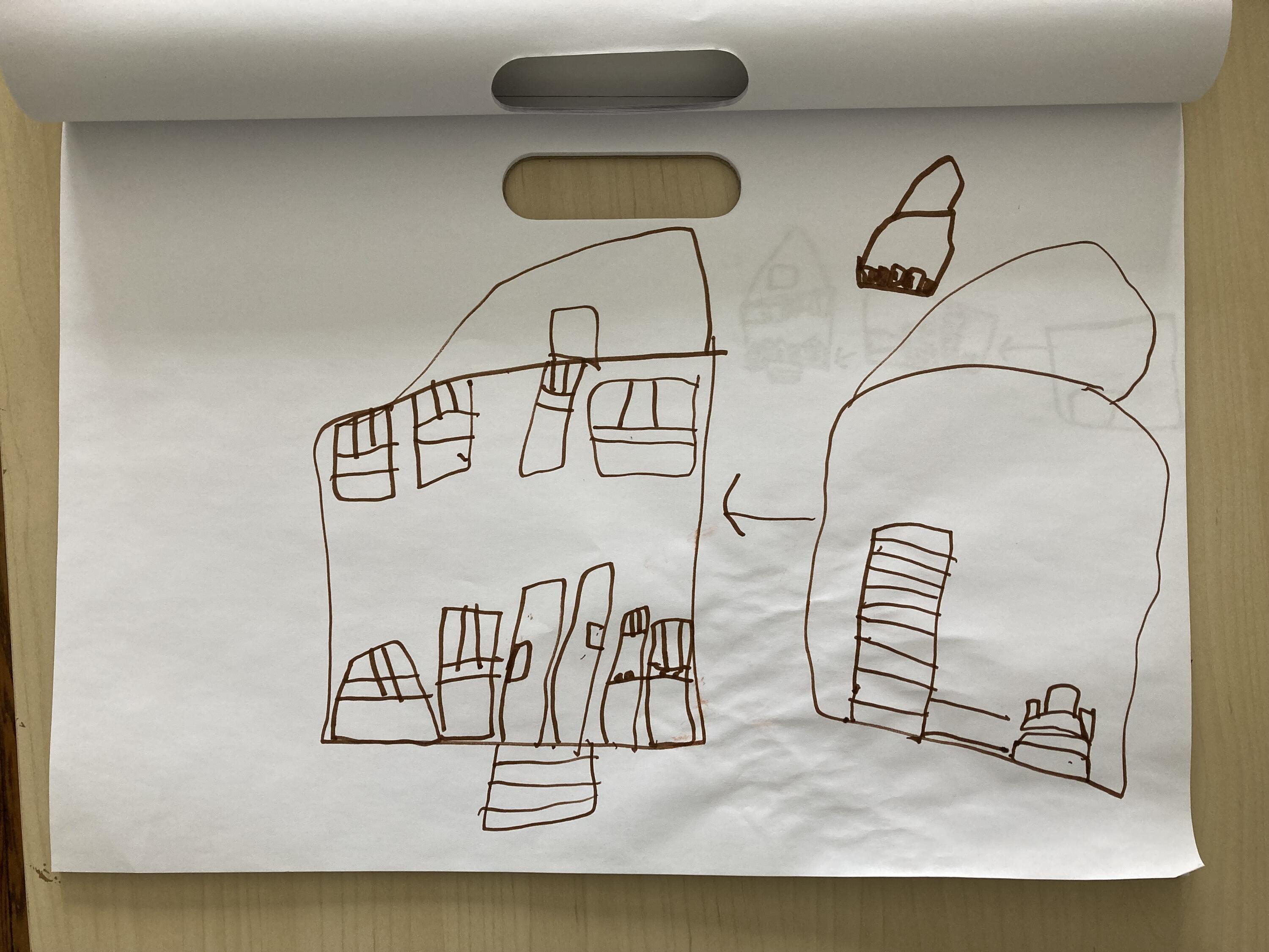 Kids drawing of their two homes.