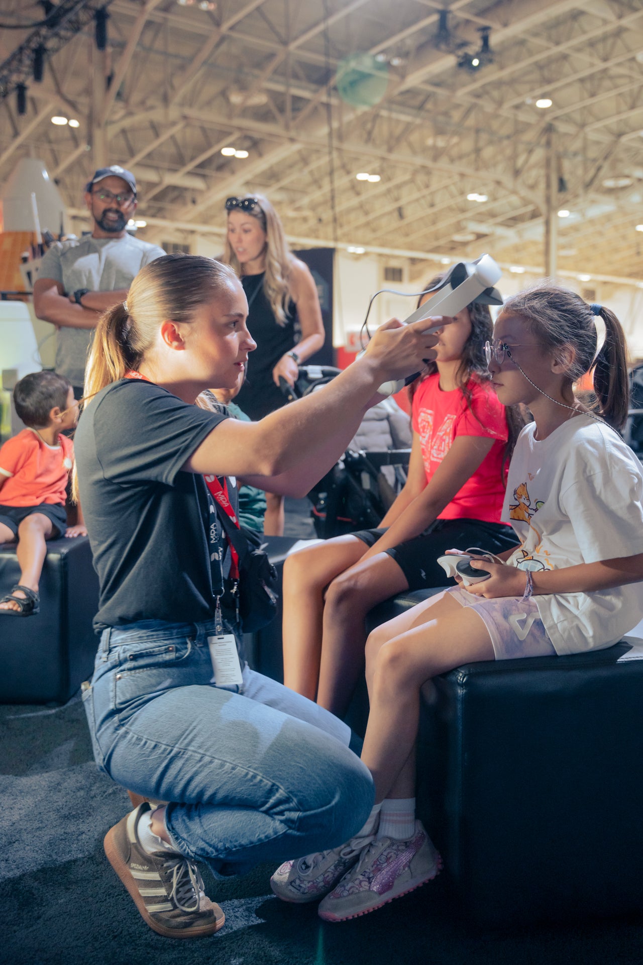 Mary McPhee helping kids through a virtual reality tour of the International Space Station