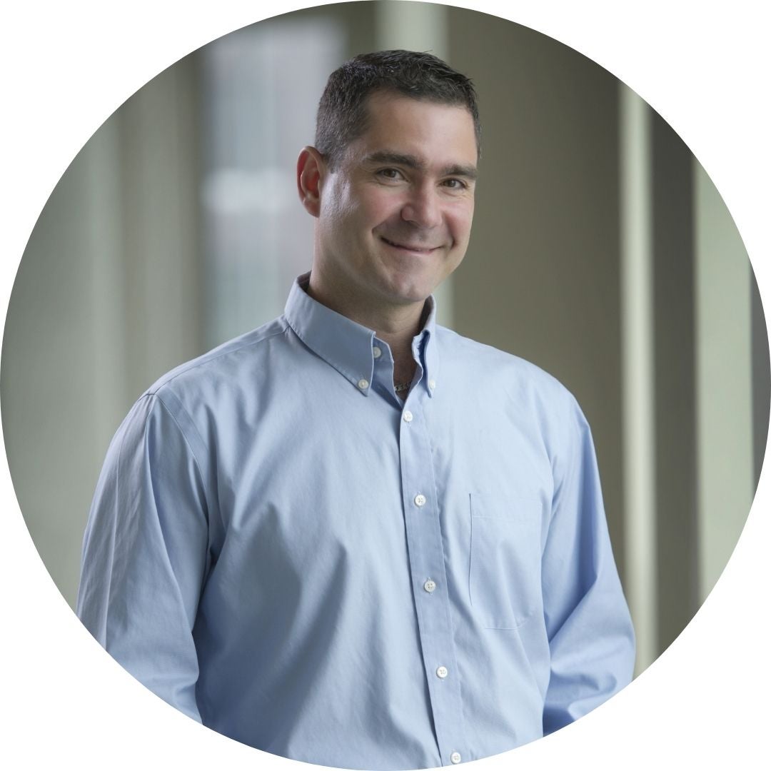 Profile photo of Roderick Slavcev in a light blue button up shirt
