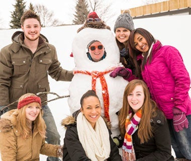 Waterloo students pose with snowman