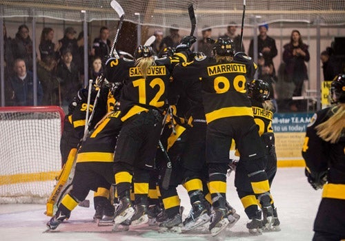 Warriors Women's hockey team celebrating win