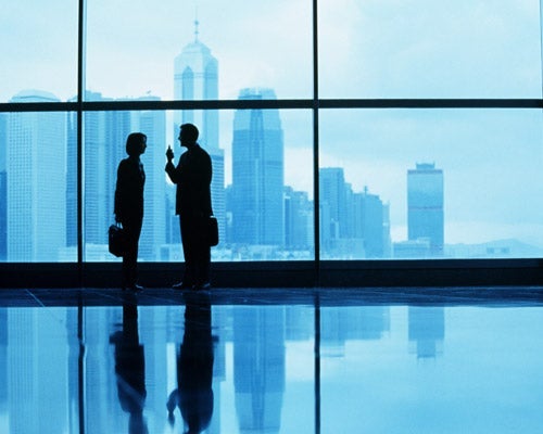workers talking at window