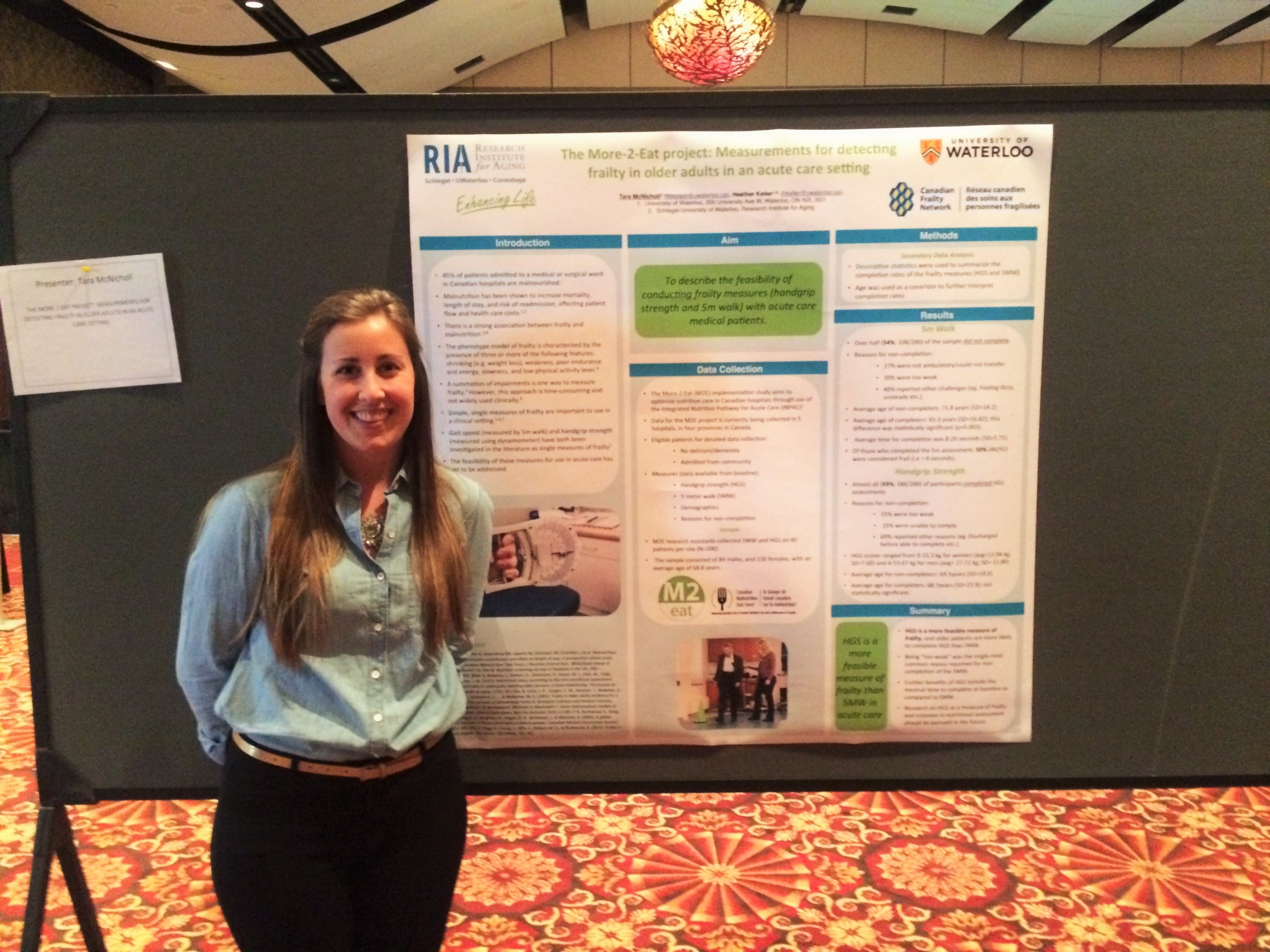 Tara with conference poster