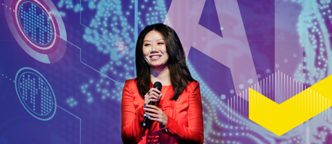 Dr. Lai-Tze Fan on stage presenting