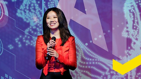 Dr. Lai-Tze Fan on stage presenting