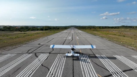 Plane about to take off on runway