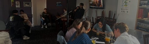 Students socializing at the Grad House