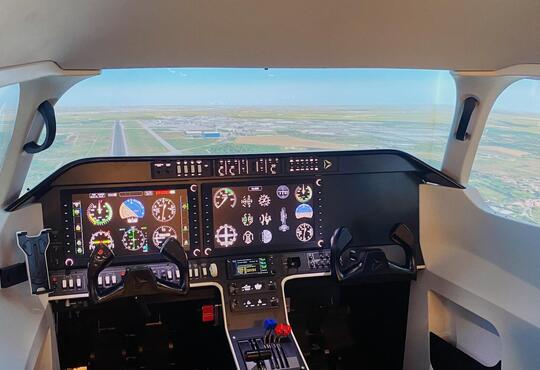 Airplane cockpit as plane approaches runway