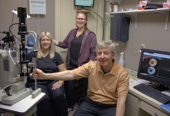 Dr. Stephen Tait, right, with optometric assistant Shannon Bylsma, left, and office manager Amber Spence, centre