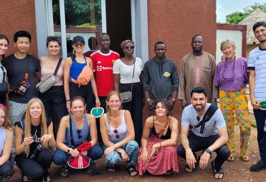 The VOSH team in Ninefecha, Senegal, with local volunteers who joined the initiative