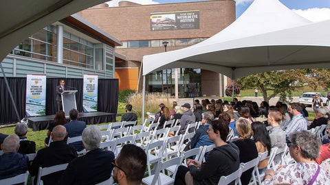 Director Stan Woo speaks at the WEI ground breaking event