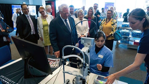 July 22, 2024 hospital announcement_optometry student presents to Doug ford and group at showcase