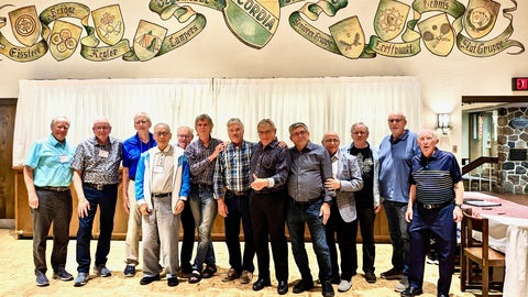 Class of 1974 stand together for a photo at the Concordia Club