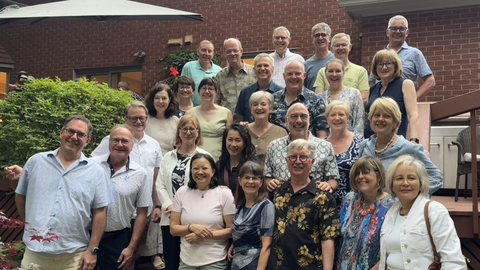 Group photo of class of 1986 on steps