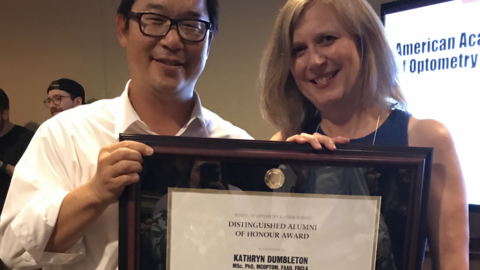 Drs Stan Woo and Kathy Dumbleton with her Alumni of honour award