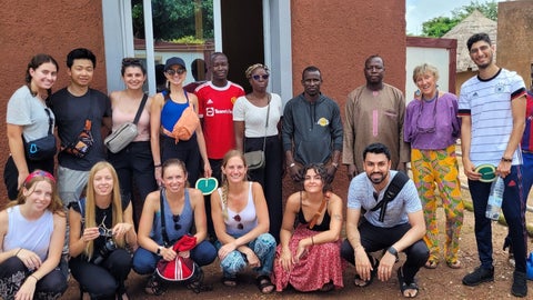 The VOSH team in Ninefecha, Senegal, with local volunteers who joined the initiative