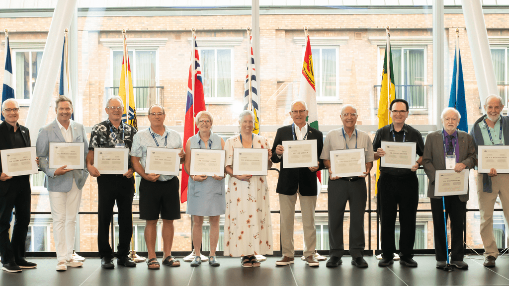 CAO past presidents lined up and holding their honorary memberships