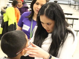 Child is fitted with glasses