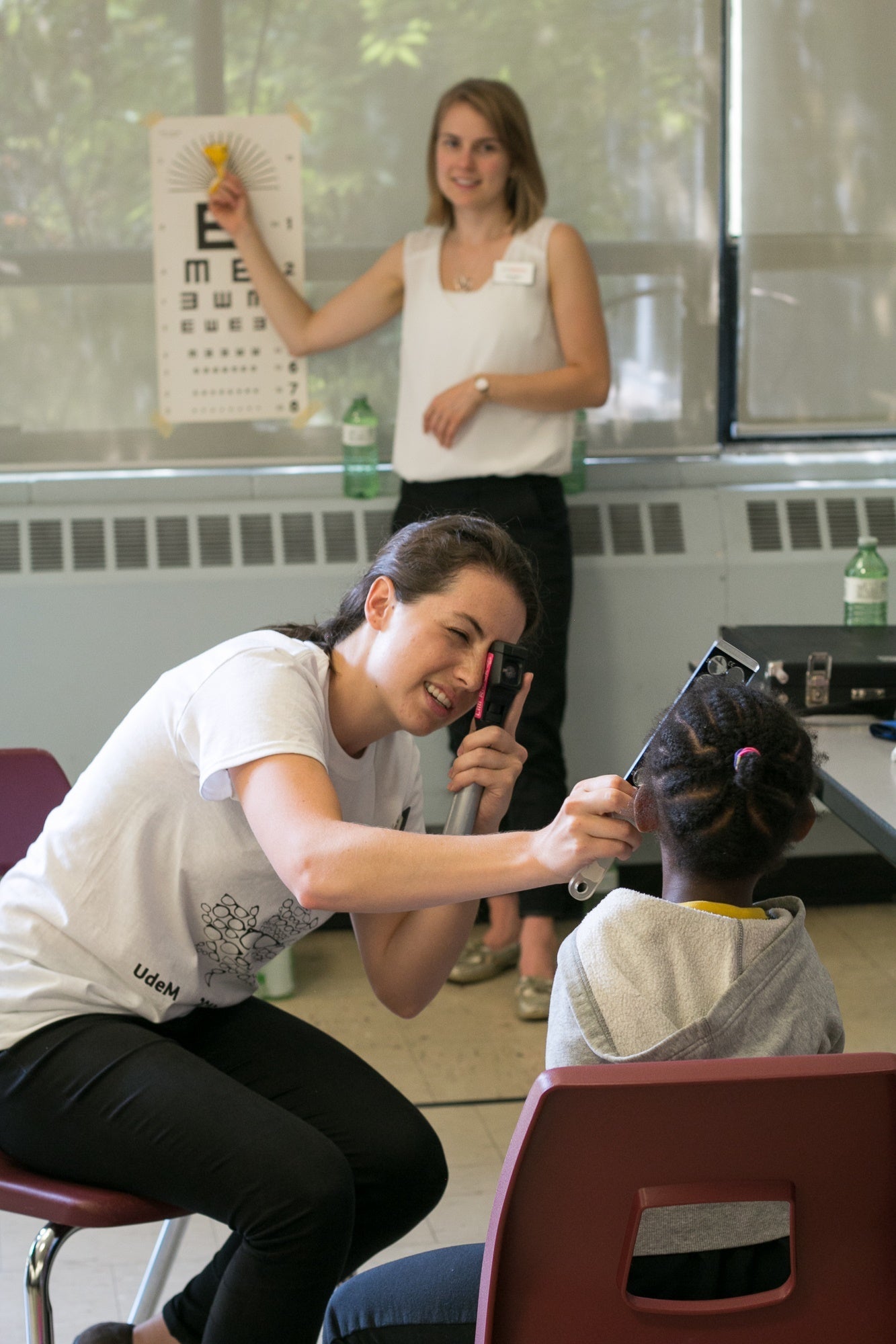 A child receives an eye exam