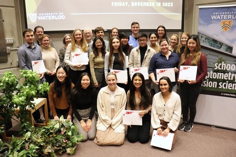 Group of students with awards