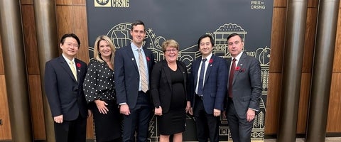 Awardees stand together for a group photo