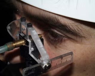 A non-contact corneal aesthesiometer