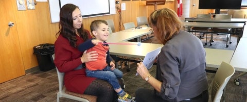 Dr. Susan Leat uses a new vision testing chart with a young patient