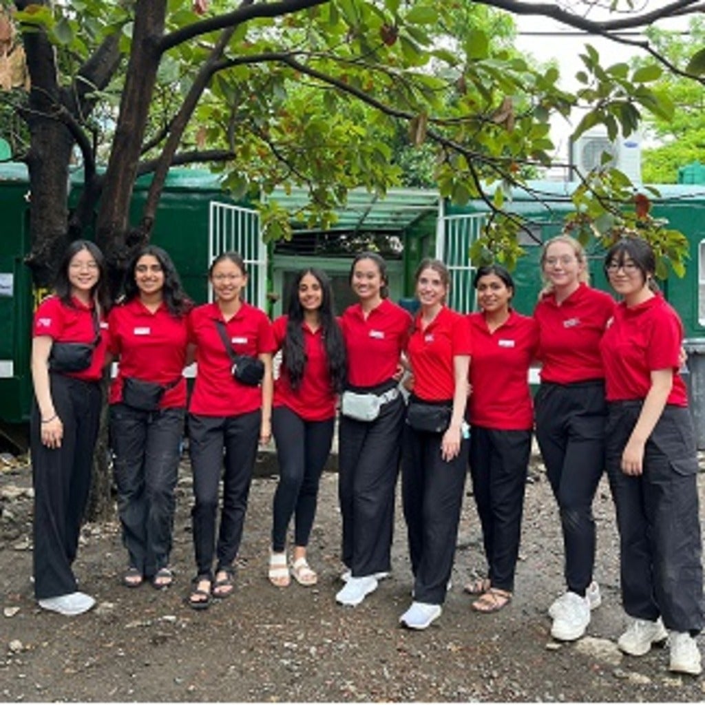 VOSH Philippines group photo in front of eye train