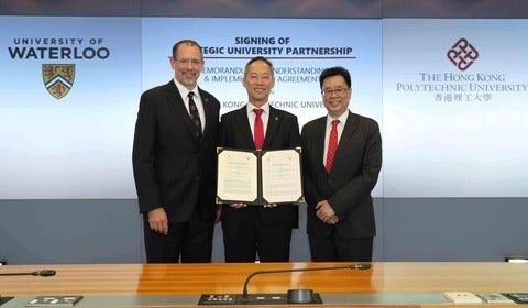 Hong Kong PolyU Vice President (Research Development), Alexander Wai holds witnessed agreement (centre) with Waterloo Dean of Sc