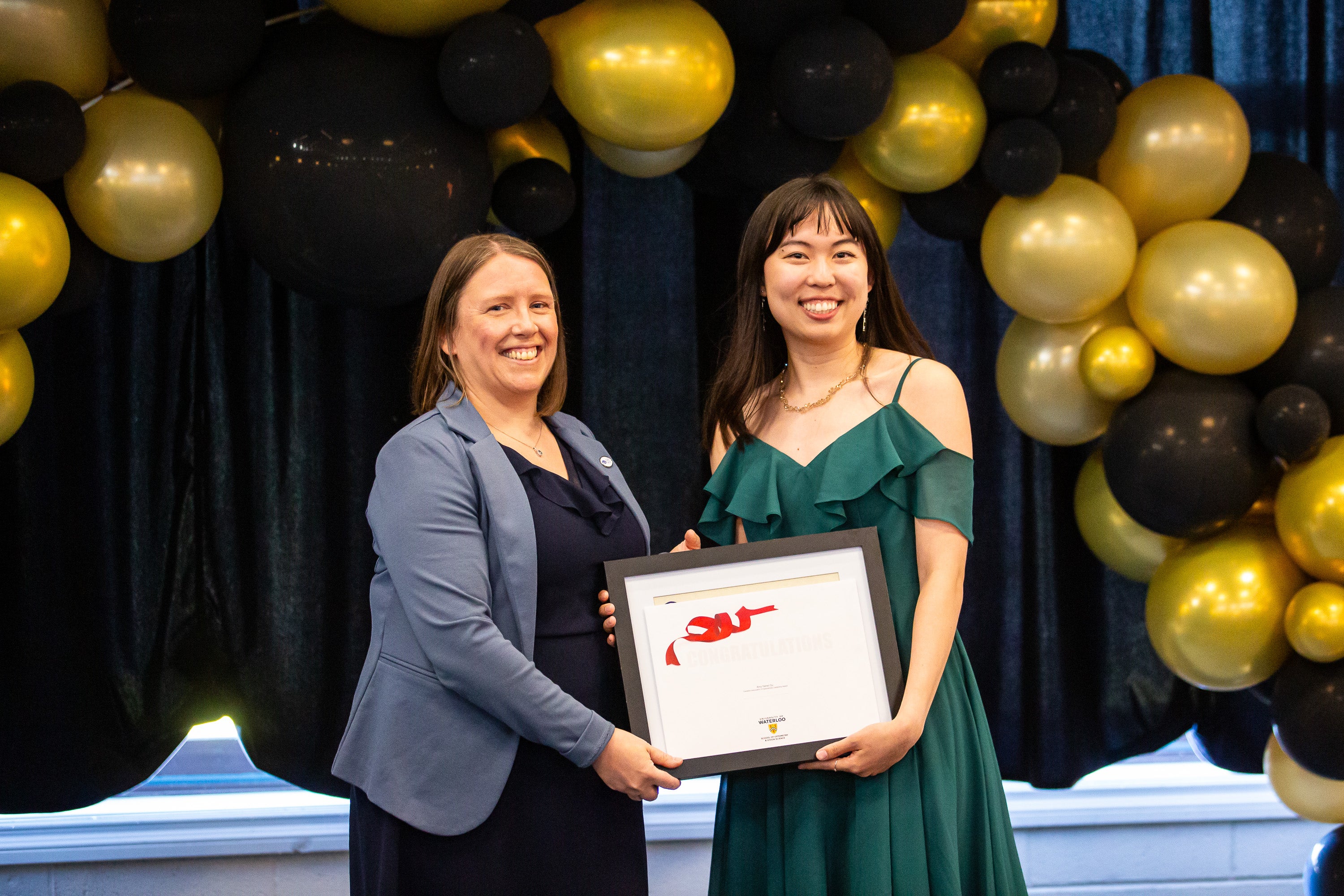 Dr. Amy Yamei Gu accepting the Canadian Association of Optometrists Leadership Award