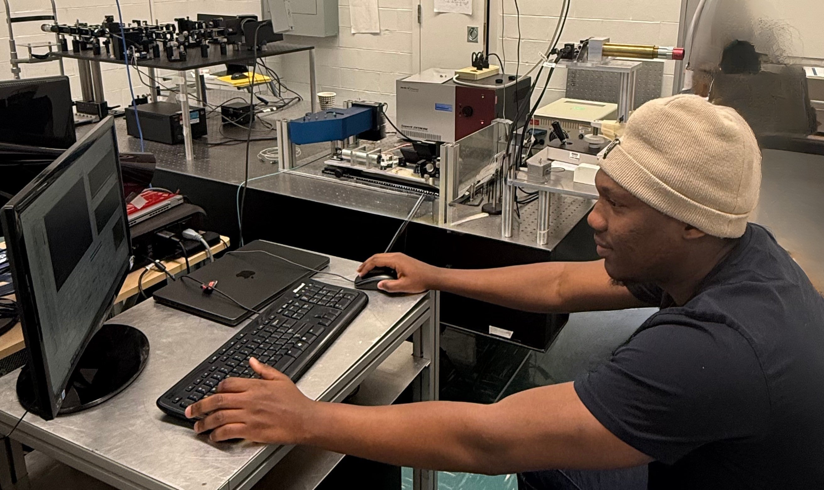 Daniel Kessie working at computer