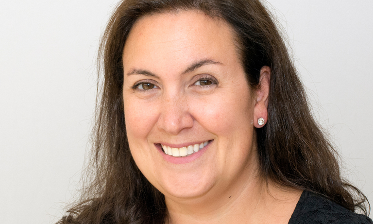 headshot of woman smiling