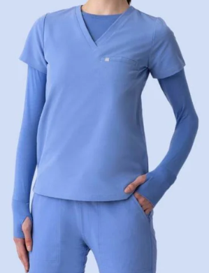 Ceil blue under scrub shirt, layered with standard scrub shirt overtop 