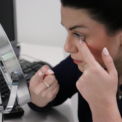 Dr. Chelsea Bray inserting a contact lens