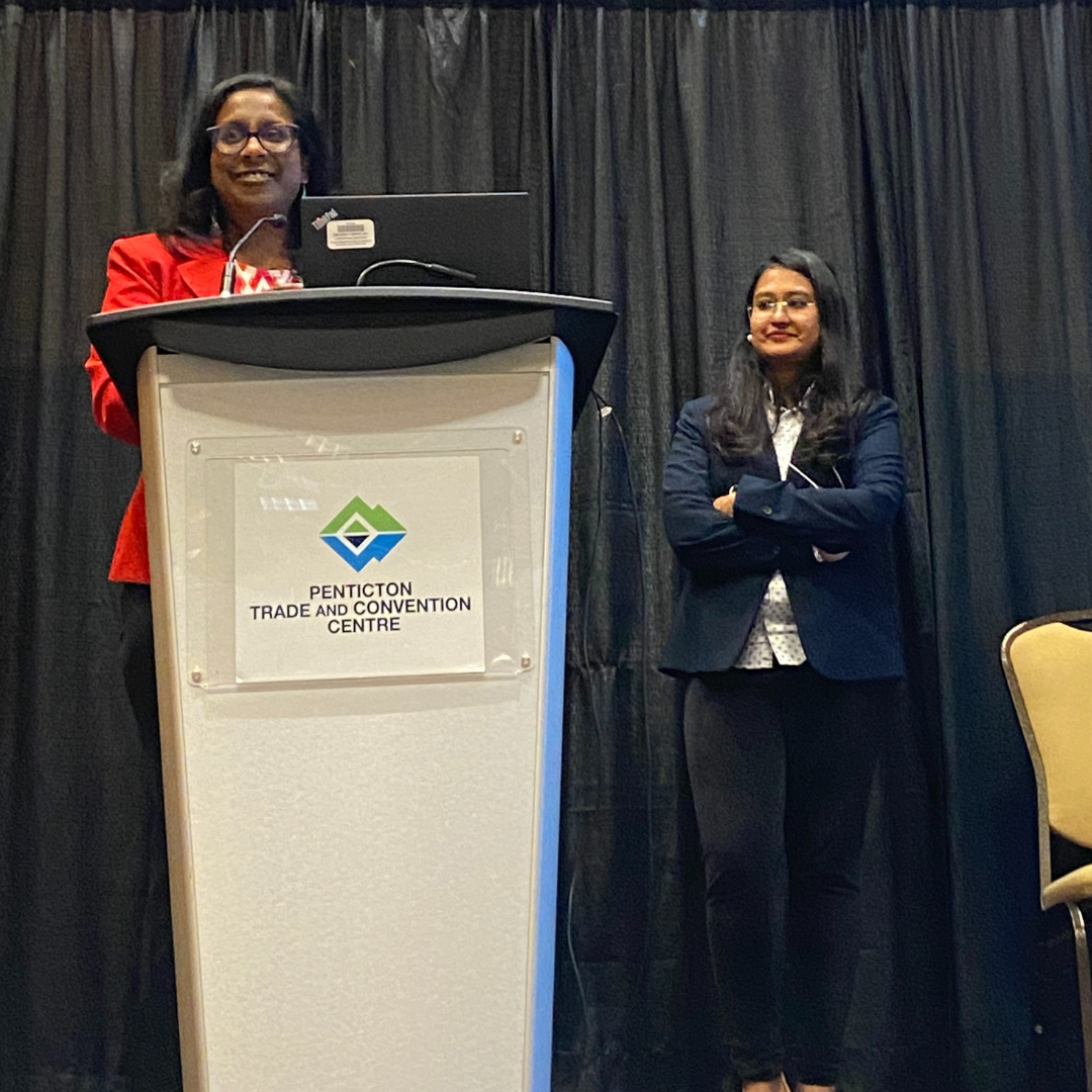 Sharmalene Mendis-Millard and Sumana Mitra presenting at the 2024 Building Resilient Communities Conference.