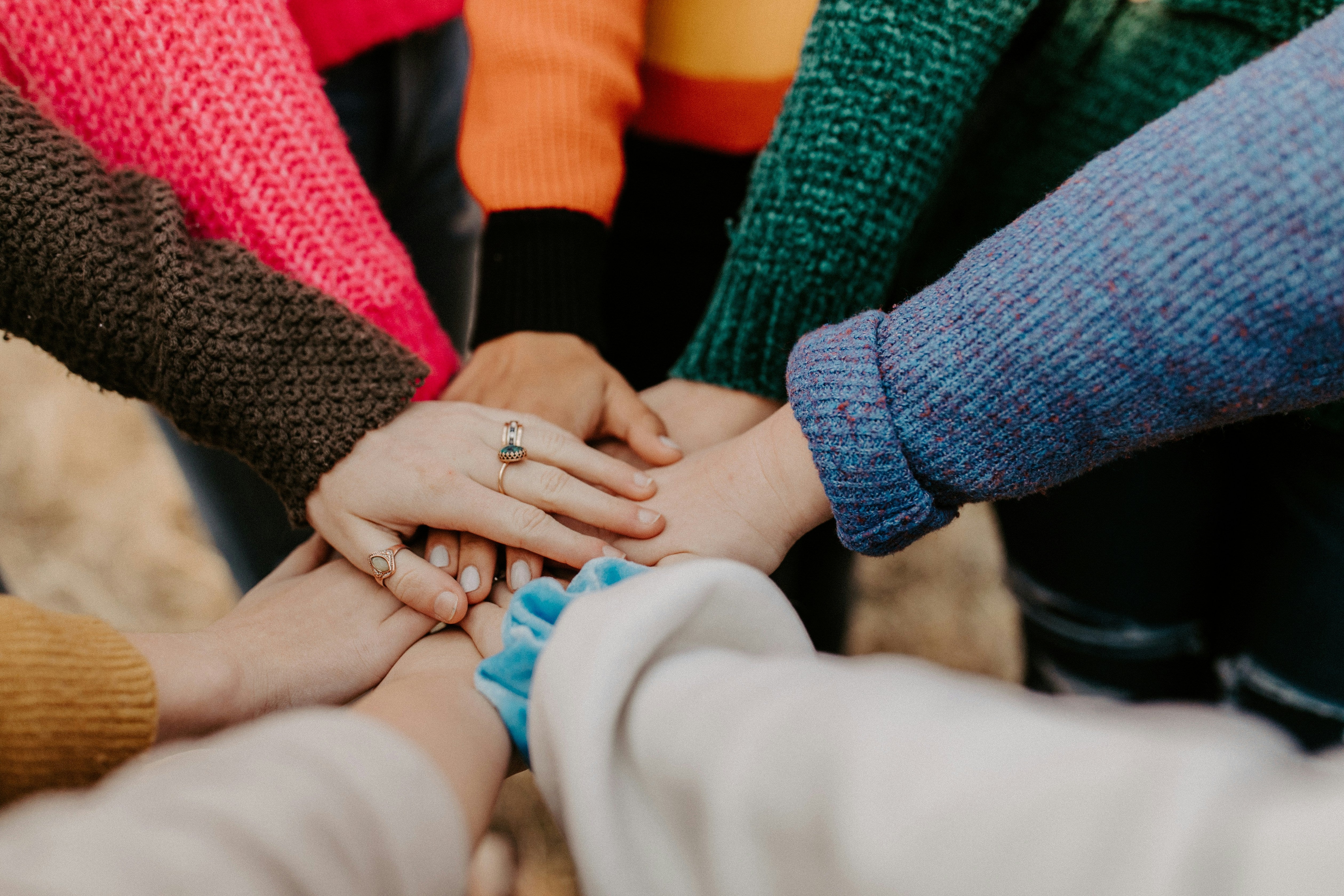 people touching hands