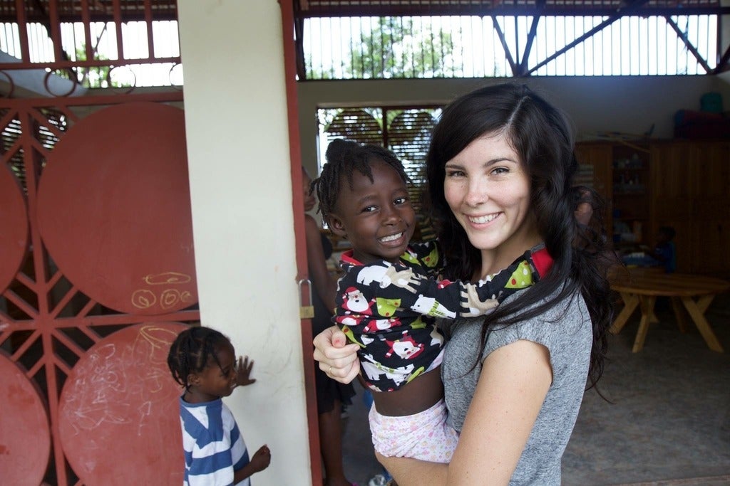 Maria Oliver with students in Haiti