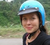 Kathryn with a moto helmet on. 