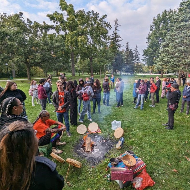 People standing by the fireplace