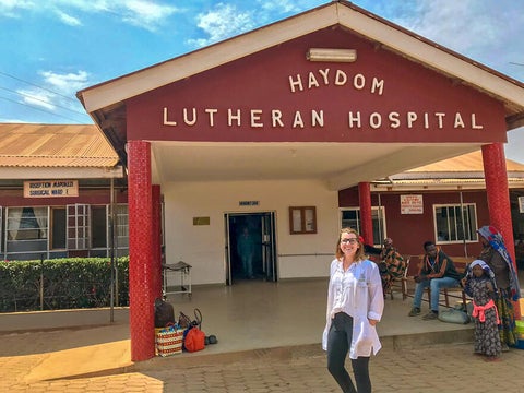 Lady standing in front of hospital