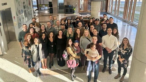 A group of people smiling