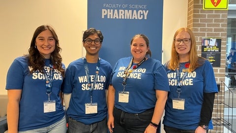 People smiling in Waterloo Science tshirts
